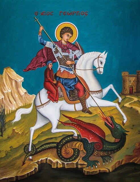 an illustration of St George astride his horse and fighting off the dragon
